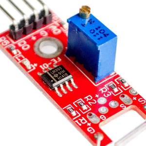Ky-025 Reed Switch Sensor - a red rectangular circuit board with a blue potentiometer, an LM393 chip, and a four-pin header connector.