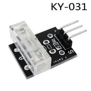 Ky-031 Ky 031 Knock Sensor Module Tap Sensor - a black PCB with a clear plastic knock sensor, a surface-mount resistor, and a three-pin male header connector.
