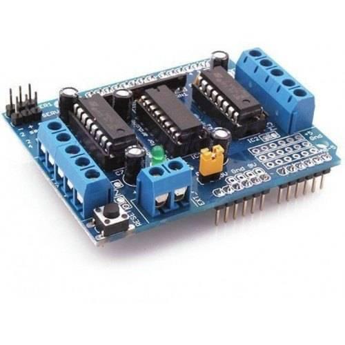 L293 L293D Motor Driver Module Arduino Motor Driver Shield - a blue rectangular circuit board featuring three integrated circuits, blue screw terminals, a reset button, and a yellow jumper.
