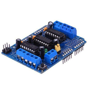 L293 L293D Motor Driver Module Arduino Motor Driver Shield - a blue circuit board featuring two integrated circuits, screw terminals, servo headers, a reset button, and pin headers.
