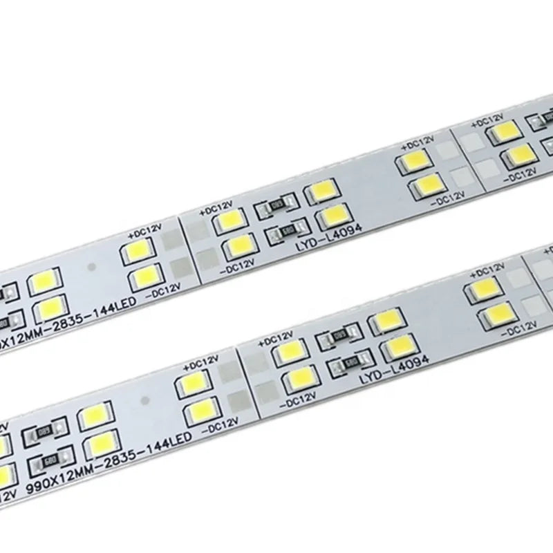 Lahore Only White LED Strip SMD White Color Ultra Thin LED Hard Aluminum Profile - a close-up of two parallel white rigid LED strips with SMD chips.