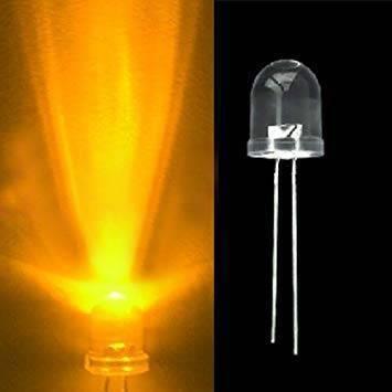 Large 10mm Yellow LED Crystal - shown as a clear component on the right and illuminated with a bright yellow light beam on the left.
