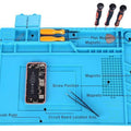 Large Heat Insulation Silicone Soldering & Repairing Mat - shown with a smartphone, tweezers, screwdrivers, and labeled magnetic storage compartments.