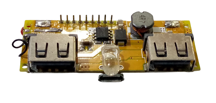 LCD Display Dual USB 5V 1A 2.1A Power Bank - two USB-A ports, a micro-USB port, an LED indicator, and a small inductor coil.