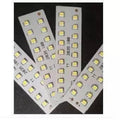 LED High Light LED Bar Light 4V 18 LED SMD LED Strip Light - four white rectangular circuit boards with rows of small yellow LED chips.