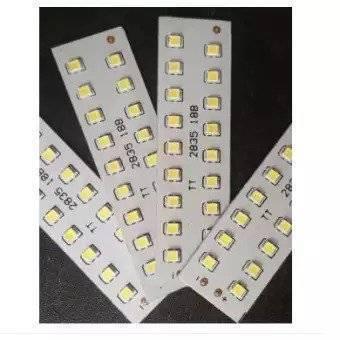 LED High Light LED Bar Light 4V 18 LED SMD LED Strip Light - four white rectangular circuit boards with rows of small yellow LED chips.