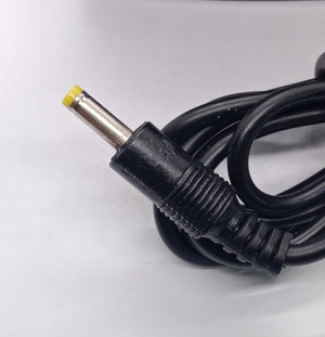 LG U+ 5V 2amp Power Adaptor Kecil Jack - close-up shot of the black power cable and its yellow-tipped cylindrical DC connector.