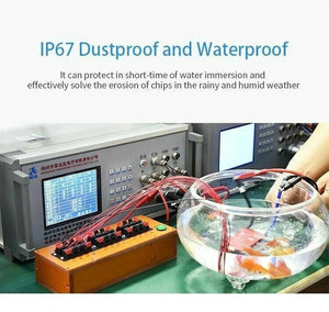 Li-ion 7s 24V Discharge 30A Charge 15A Lithium Battery Protection Board With Balance Pcm BMS - submerged in a glass bowl of water connected to a testing device with a screen.