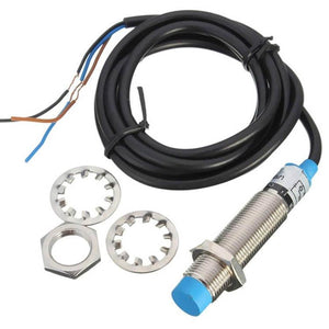 LJ12A3-4-J/BY (proximity Sensor, Inductive, NPN-no Output) - with a blue tip, black cable, two metal washers, and a nut.