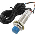 LJ18A3-8-Z/BX 8mm NPN D/o Proximity Sensor - with a metallic cylindrical body, blue plastic tip, black cable, and three exposed wire ends.