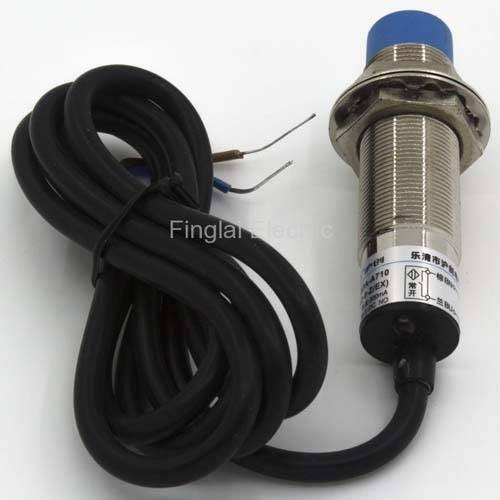 LJ18A3-8-Z/EX Cylinder Proximity Sensor - a metallic cylindrical sensor with a blue cap, a black cable, and a label with technical text.
