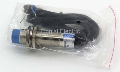 LJ18A3-8-Z/EX Cylinder Proximity Sensor - clear plastic bag with a blue-tipped metal threaded body, a black cable, and a label with visible text.
