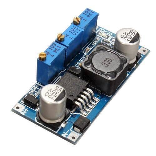 LM2596 DC-DC Step Down Cc Cv Power Supply Module LED Driver Battery Charger Adjustable LM2596S Constant Current Voltage - a blue circuit board with three adjustable potentiometers, a black inductor, two cylindrical capacitors, and pins.