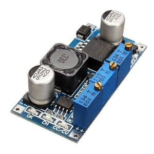 LM2596 DC-DC Step Down Cc Cv Power Supply Module LED Driver Battery Charger Adjustable LM2596S Constant Current Voltage - a blue circuit board featuring two silver capacitors, a black inductor, and three adjustable blue potentiometers.