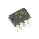 LM358 Op Amp IC In Paksitan - a black, rectangular 8-pin dual operational amplifier integrated circuit with white printed text on its surface.