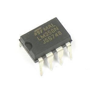 LM358 Op Amp IC In Paksitan - a black, rectangular 8-pin dual operational amplifier integrated circuit with white printed text on its surface.