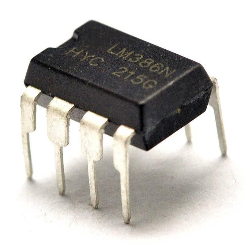 LM386 IC Audio Power Amplifier - an 8-pin black integrated circuit chip with silver metal leads, shown from an angled perspective against a white background.