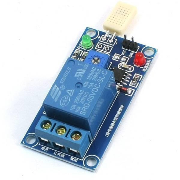 LM393 Indicator Light 1 Channel Digital Humidity Sensor Relay Module - a blue circuit board with a relay, a white sensor, and two LED indicators.