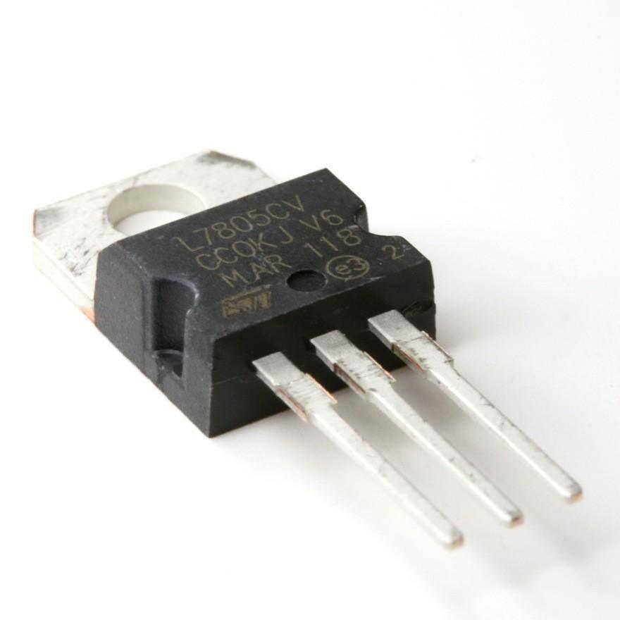 LM7805 7805 Voltage Regulator 5V Voltage Regulator - a black three-terminal electronic component with a metal heat sink tab and printed text on its face.
