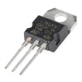 LM7812 Voltage Regulator IC Chip - a black three-pin electronic component with a metal mounting tab, shown from an angled perspective.