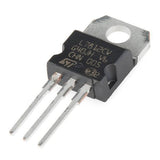 LM7812 Voltage Regulator IC Chip - a black three-pin electronic component with a metal mounting tab, shown from an angled perspective.