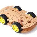 Local 4wd Smart Robot Car Chassis Kit For Arduino - a tan acrylic frame with four yellow wheels and black tires.
