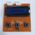 Local Inverter LCD - a blue rectangular display screen, three black push buttons, two white connectors, and an ISA062 label on an orange circuit board.