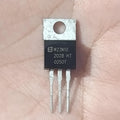 M22N10 100V 22A N-Channel Power MOSFET (TO-220) - a black TO-220 electronic component with three metal pins and a mounting hole, held in a hand with text printed on its surface.