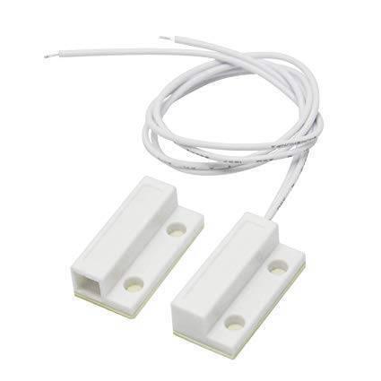 Magnetic Door Sensor Switch Magnetic Read Switch - two white rectangular plastic magnetic reed switch components connected by a white two-wire cable.