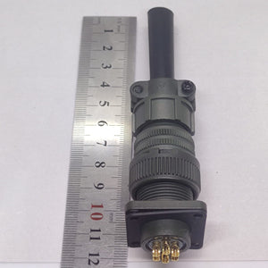 Maojwei IS09001 14S-6p Military Connector - shown next to a metal ruler for scale, featuring a green cylindrical housing and a six-pin circular connector.