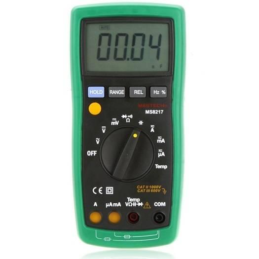 Mastech MS8217 Auto Range Digital Multimeter - a green handheld device showing 00.04 on its display with a central rotary dial and input ports below.
