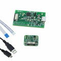 MAX30101/ MAX30102 Accevkit - two green circuit boards, a flat ribbon cable, and a USB cable on a white background.