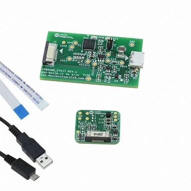 MAX30101/ MAX30102 Accevkit - two green circuit boards, a flat ribbon cable, and a USB cable on a white background.