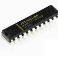 MAX7219 Seven Segment And Dot Matrix Display Driver - a black, rectangular 24-pin integrated circuit chip with white metal leads.