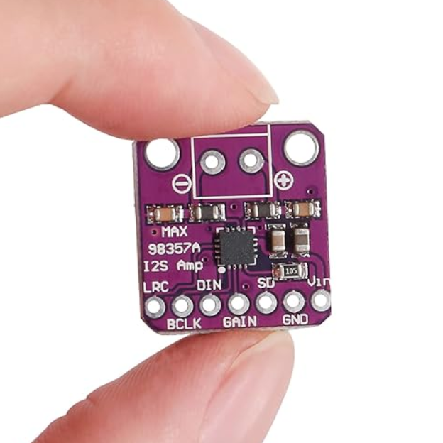 MAX98357 I2s Pcm Digital Audio Amplifier Board - 3W Class D DAC Decoder - a purple square PCB with a central chip, surface-mount components, and pin labels.