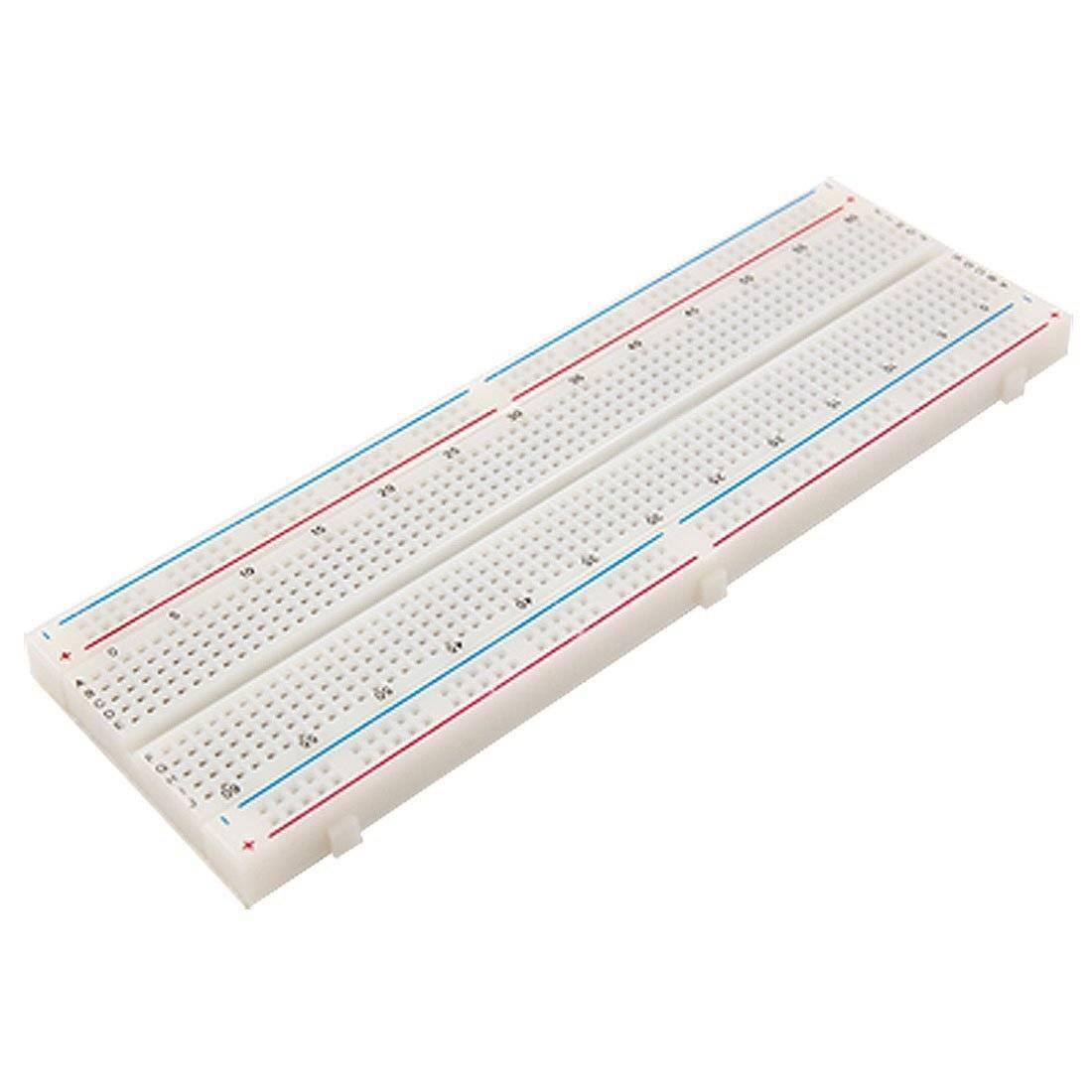 MB102 Breadboard 830 Points Solderless Prototyping Breadboard High Quality - with 830 tie points, shown at an angle with its numbered contact rows and red and blue power rails along both edges.