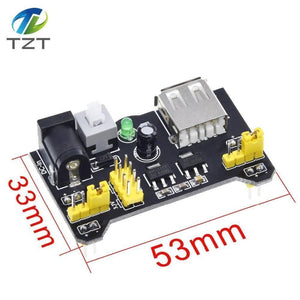 MB102 Breadboard Power Supply Module 3.3V/5V For Arduino Solderless Bread Board - a black circuit board with a DC input jack, USB port, power button, LED, and yellow jumpers with dimension labels.