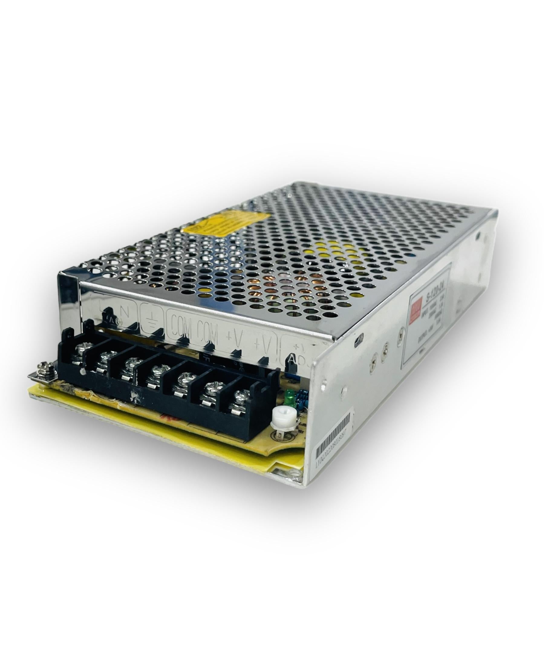 Meanwell 120W 5A 24V 5A Meanwell Power Supply - a silver rectangular metal unit with a perforated top, screw terminal block, and a white adjustment knob.