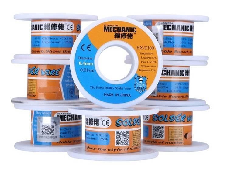 Mechanic HX-T100 0.4mm 50 Grams Soldering Wire - shown as a stack of multiple orange and blue plastic spools with product specifications printed on the labels.