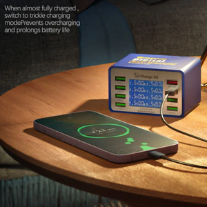 Mechanic Icharge 8p / 8s Qc 3.0 Multi-port Smart Fast Charger With Digital Display - a blue rectangular device with a digital display showing port readings, connected to a smartphone on a wooden table.