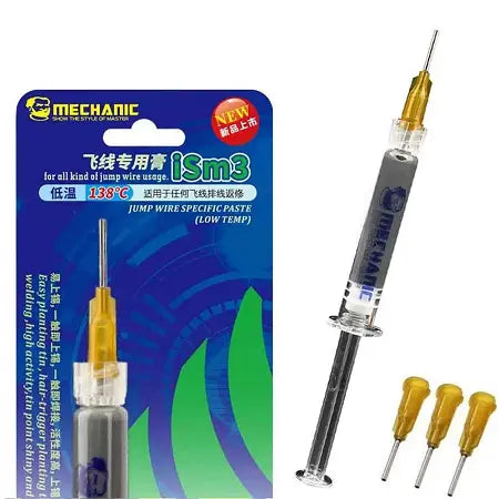 MECHANIC iSm3 PASTE FOR JUMPER WIRE - Soldering Flux - syringe of grey soldering paste with a yellow needle, three extra needles, and a blue and green branded cardboard blister pack labeled mechanic iSm3.
