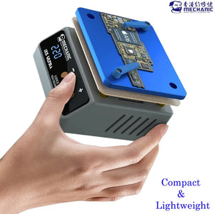MECHANIC IX5 ULTRA UNIVERSAL PREHEATING PLATFORM - grey heating station with a blue metal fixture, digital display labeled MECHANIC IX5 ULTRA, and two small levers holding a circuit board.
