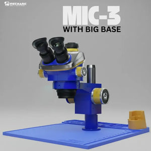 MECHANIC MIC3 B11 TRINOCULAR STEREO MICROSCOPE - blue and silver binocular microscope with gold-toned knobs and a black logo, mounted on a large, flat blue rectangular work mat with a small gold-toned accessory cup.