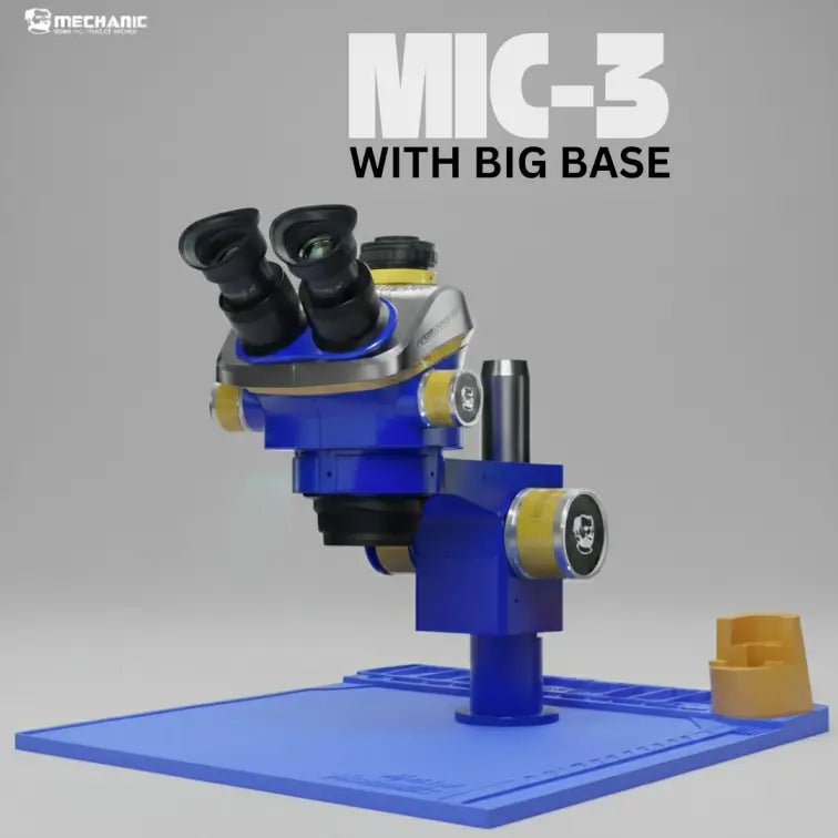 MECHANIC MIC3 B11 TRINOCULAR STEREO MICROSCOPE - blue and silver binocular microscope with gold-toned knobs and a black logo, mounted on a large, flat blue rectangular work mat with a small gold-toned accessory cup.