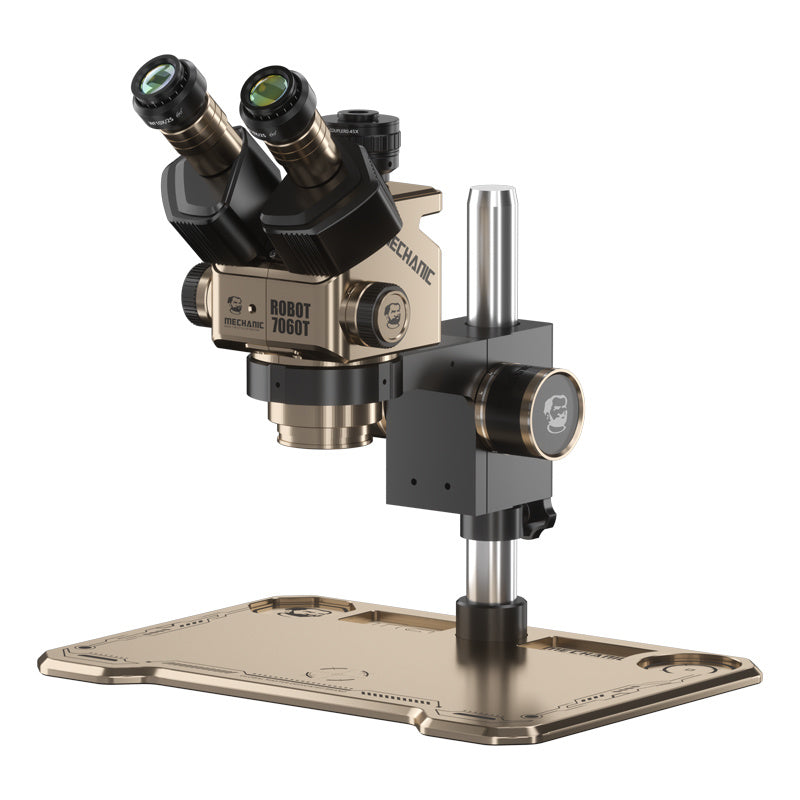 MECHANIC ROBOT 7060T-TG 60X TRINOCULAR STEREO MICROSCOPE - bronze and black binocular microscope with a wide flat base, labeled "Mechanic" and "Robot 7060T," featuring two eyepieces and a vertical adjustment knob.
