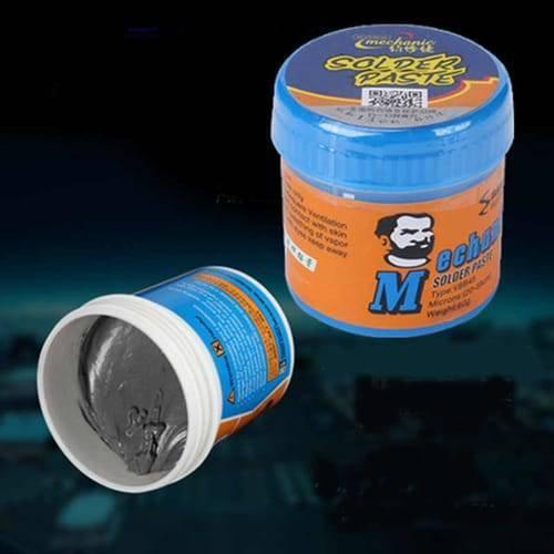 Mechanic Soldering Flux Paste 42gram Soldering Tin V5B45 Solder Welding Cream - two containers of grey soldering paste, one with a blue lid and orange label and one open to reveal the contents.