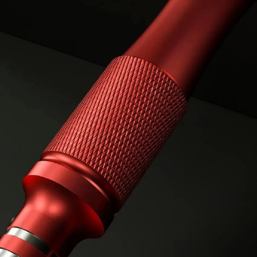 MECHANIC STAR 0.8 SCREWDRIVER (MAX3) - cylindrical metallic red tool handle with a knurled textured grip section and a smooth tapered end, set against a dark background.