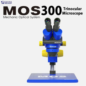 MECHANIC SUPER X PRO-B11 TRINOCULAR STEREO MICROSCOPE - blue trinocular microscope with yellow adjustment knobs, marked with mechanic branding and mos300 label on a rectangular blue base.