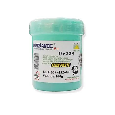 MECHANIC UV 223 HALOGEN FREE FLUX PASTE - Soldering Flux - cylindrical mint-green plastic tub of Mechanic Uv223 flux paste with white product label featuring text, a barcode, and a man's face icon.