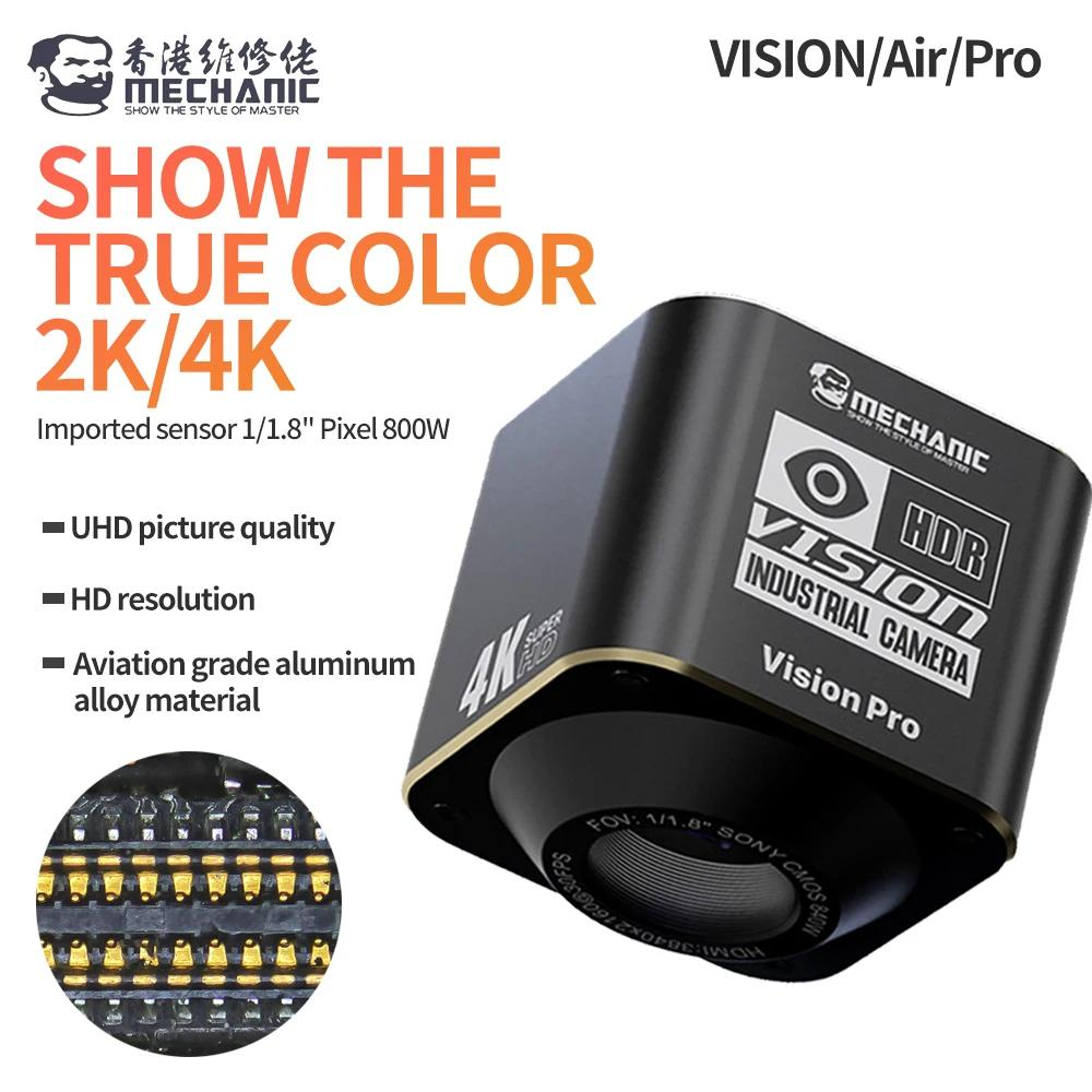 MECHANIC VISION AIR MICROSCOPE CAMERA - black square industrial camera with gold trim, labeled with text including "Mechanic," "Vision," and "4K," featuring a centered circular lens and a gold connector.